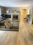 Ash wood flooring has a prominent grain.