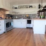 kitchen with wide plank live sawn white oak flooring natural oil finish